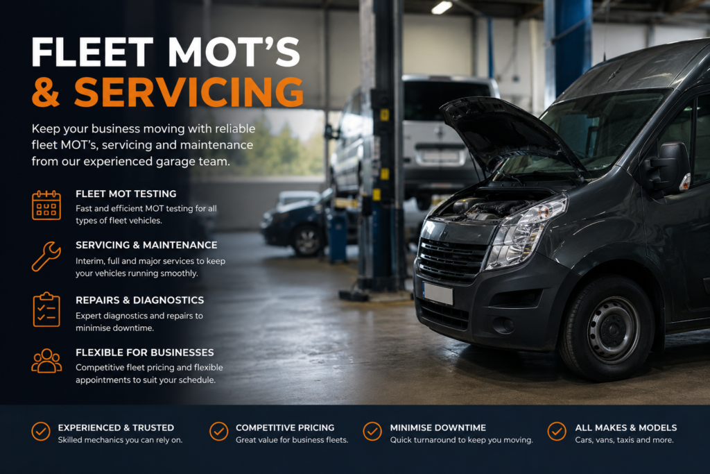 Commercial van inside a professional garage workshop during fleet MOT and servicing maintenance.